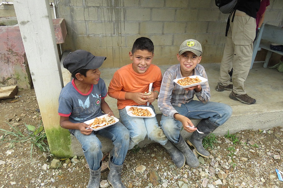 Three young dental patients eating together