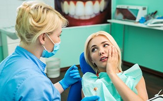 woman visiting dentist for emergency