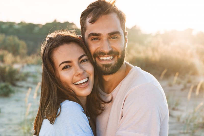 a couple smiling